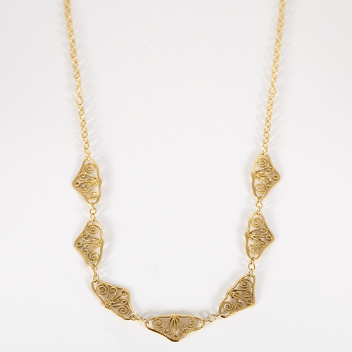 Élégant collier draperie en or jaune