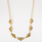 Élégant collier draperie en or jaune