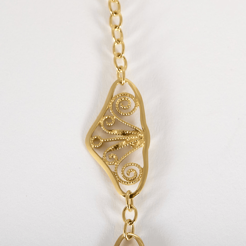 Élégant collier draperie en or jaune