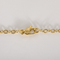 Élégant collier draperie en or jaune