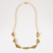 Élégant collier draperie en or jaune