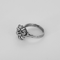 52.5 Bague marguerite en or blanc et diamants : 0,08 carat 58 Facettes DV34342-1