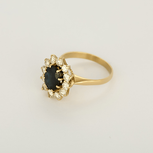 Bague marguerite en or jaune, diamants et saphir