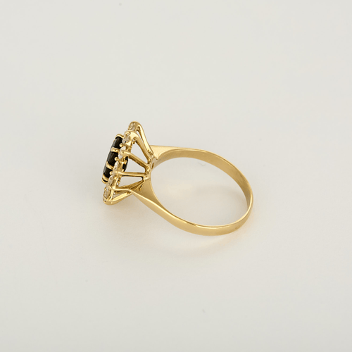 Bague marguerite en or jaune, diamants et saphir