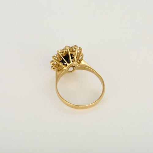 Bague marguerite en or jaune, diamants et saphir
