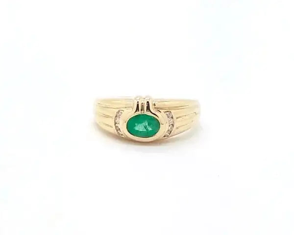 Bague Bague en or jaune avec émeraude brésilienne de 0,55 carat et diamants 58 Facettes 5434