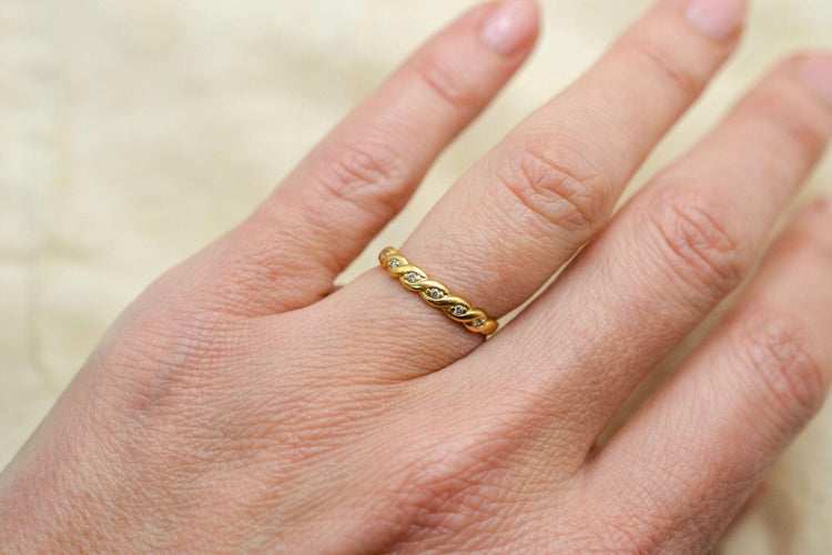Bague 52.5 Bague anneau torsadé en or jaune 18 carats et diamants 58 Facettes 3891