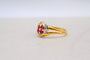 Bague 53 Bague tourbillon à volutes en or jaune 18 carats et rubis 58 Facettes 3873