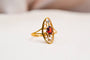Bague 55 Bague Art Nouveau navette en or jaune 18 carats grenat et diamants 58 Facettes 3810