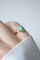 Bague 47 Bague marguerite cabochon turquoise en or jaune 18kt et diamants 58 Facettes