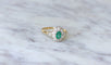 Bague 65 Bague marguerite en or jaune et blanc 18k, émeraude et diamants 58 Facettes