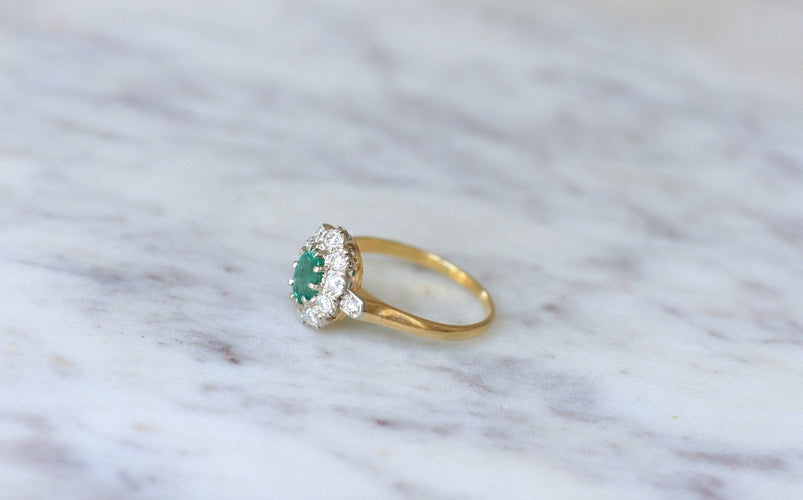 Bague 65 Bague marguerite en or jaune et blanc 18k, émeraude et diamants 58 Facettes