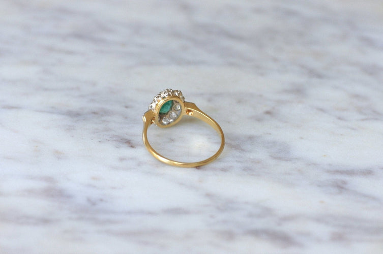 Bague 65 Bague marguerite en or jaune et blanc 18k, émeraude et diamants 58 Facettes