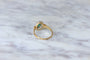 Bague 65 Bague marguerite en or jaune et blanc 18k, émeraude et diamants 58 Facettes