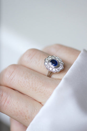 Bague 60 Bague marguerite - Bague entourage en or jaune 18kt rhodié, saphir et diamants 58 Facettes