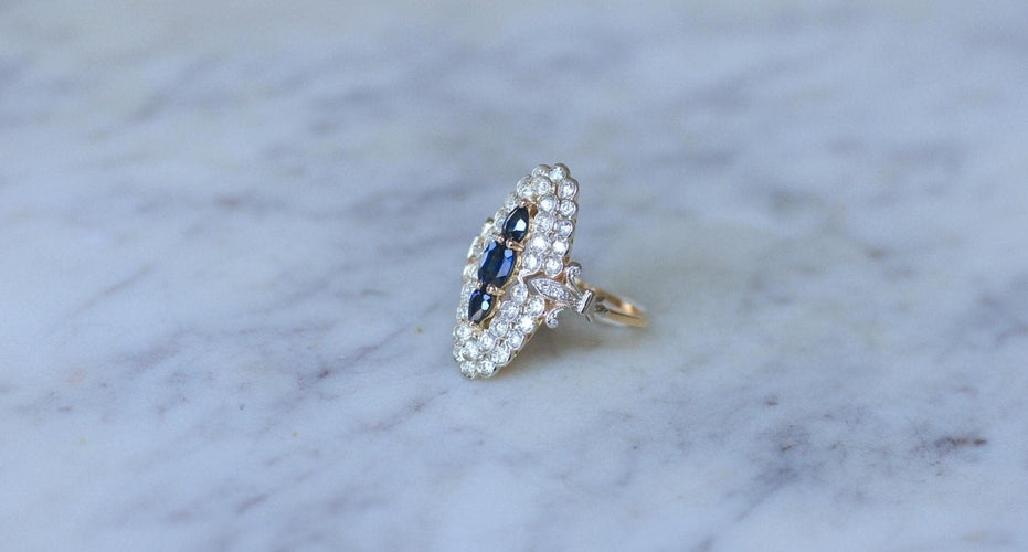 Bague 53 Bague marquise en or jaune et blanc 18kt et saphirs, diamants 58 Facettes