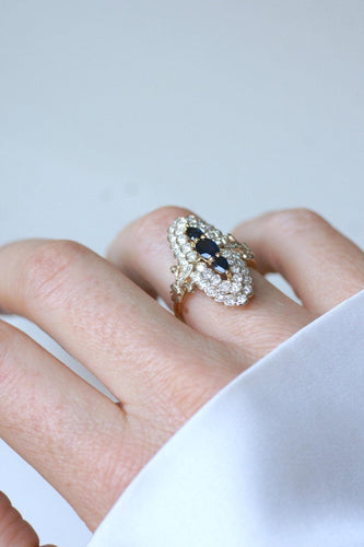 Bague 53 Bague marquise en or jaune et blanc 18kt et saphirs, diamants 58 Facettes
