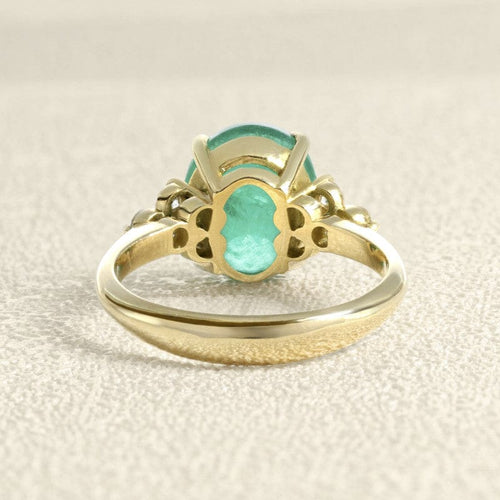 Bague 55 Bague en or jaune 18 carats avec émeraude et diamants 58 Facettes 61600013