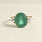 Bague 55 Bague en or jaune 18 carats avec émeraude et diamants 58 Facettes 61600013