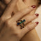 Bague 57 Bague trilogie en or gris et jaune 18 carats avec émeraude, saphir et topaze 58 Facettes FB11085
