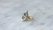 Bague 55 Bague volutes en or jaune 18k et diamants, opales 58 Facettes