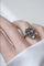 Bague 55 Bague volutes en or jaune 18k et diamants, opales 58 Facettes