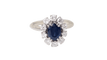 Bague 54 Bague marguerite en or blanc 18 ct, saphir ovale et diamants 58 Facettes 32893