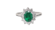 Bague 49 Bague marguerite en or blanc 18 kt, émeraude et diamants 58 Facettes 32907