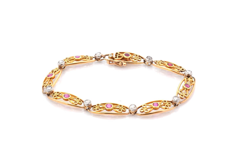 Bracelet Bracelet 1900 en or 18k avec rubis et diamants 58 Facettes 26718