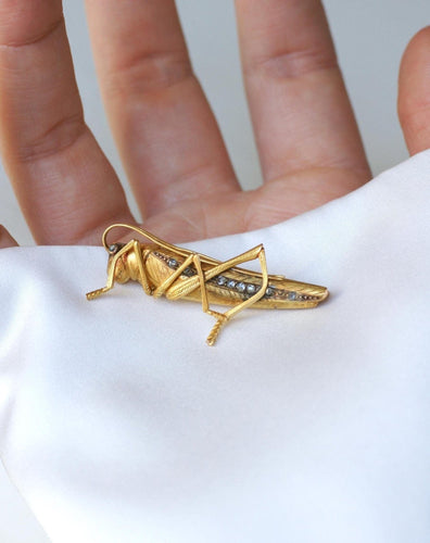 Broche Broche sauterelle ancienne en or jaune 18kt et diamants 58 Facettes