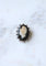 Broche Broche camée en onyx en or rose et diamants 58 Facettes