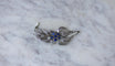 Boucles d'oreilles Boucheron - Broche clip feuillage en or blanc, platine, saphirs et diamants 58 Facettes
