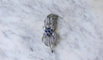 Boucles d'oreilles Boucheron - Broche clip feuillage en or blanc, platine, saphirs et diamants 58 Facettes