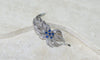 Boucles d'oreilles Boucheron - Broche clip feuillage en or blanc, platine, saphirs et diamants 58 Facettes