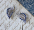 Boucles d'oreilles Boucles d’oreilles à clip plume en or blanc 18k et saphirs 58 Facettes