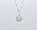 Collier Collier spirale arabe - Pendentif en or blanc 18 ct et diamants 2,60 ct 58 Facettes 8508
