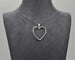 Collier Collier - Pendentif cœur en or blanc 18 ct et diamants 0,38 ct 58 Facettes 10433