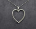 Collier Collier - Pendentif cœur en or blanc 18 ct et diamants 0,38 ct 58 Facettes 10433