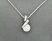 Collier Collier - Pendentif en or blanc 18 ct avec perle et diamants 58 Facettes 10852