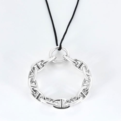 Pendentif Hermès Chaîne d'Ancre - Pendentif rond en argent et cordelière en coton noir 58 Facettes 58FC38