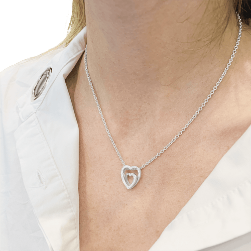 Collier Cartier Cœurs - Collier en or blanc et diamants 58 Facettes 34760