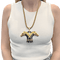 Pendentif Pendentif FRED double tête de cheval en or jaune et corne. 58 Facettes 34724