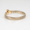 Bracelet Bulgari Tubogas - Bracelet vintage en or jaune 18k et acier 58 Facettes G13646