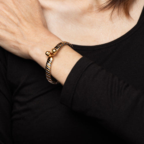 Bracelet Bulgari Tubogas - Bracelet vintage en or jaune 18k et acier 58 Facettes G13646