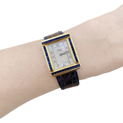 Montre Poiray Ma Première - Montre en or jaune, nacre et saphirs 58 Facettes 35127