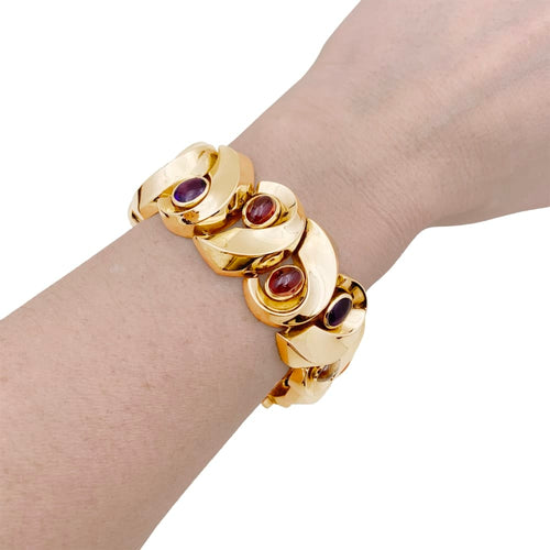 Bracelet Bracelet vintage en or jaune 750 serti d’améthystes, grenats et quartz rutile 58 Facettes 35227
