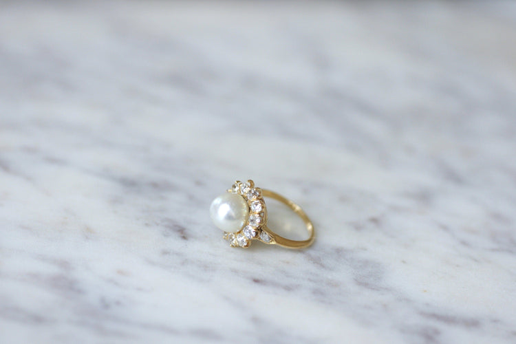 Bague 50 Bague marguerite ancienne en or jaune 18kt, diamants et perle fine 58 Facettes