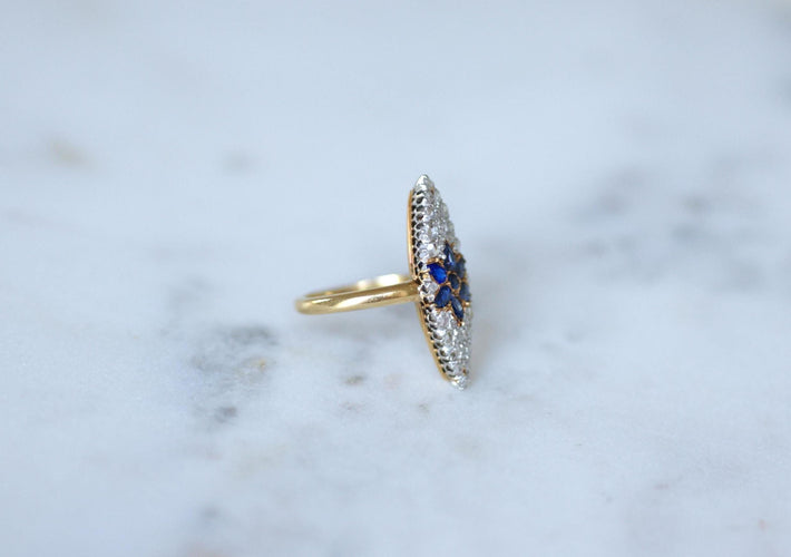 Bague 50 Bague marquise étoile en or jaune 18k et platine, saphirs et diamants 58 Facettes