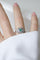 Bague 56 Bague Art Déco sertie d’une émeraude en platine et diamants 58 Facettes