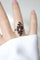 Bague 55 Bague marquise en or rose 18kt et grenats sur paillon 58 Facettes